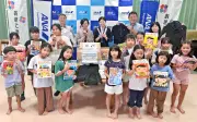 ANA沖縄空港、式服35着や絵本約190冊を県内の子どもたちへ寄贈