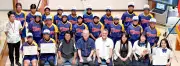 うんな中ソフトボール部が県大会優勝、吹奏楽部は金賞　恩納村役場で報告