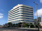 全保連、那覇ポートビルへ本社移転 12月21日から営業開始